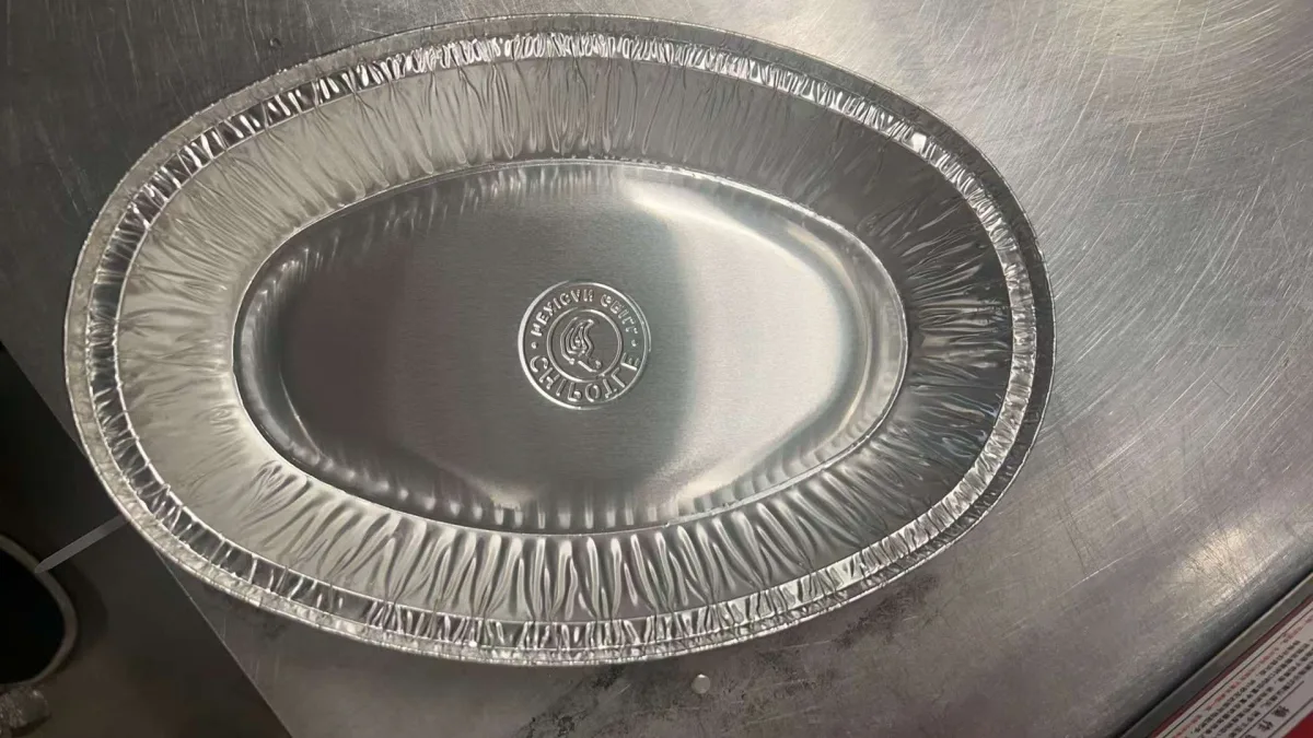 Custom embossed aluminum pan produced for Chipotle by PT Green Source